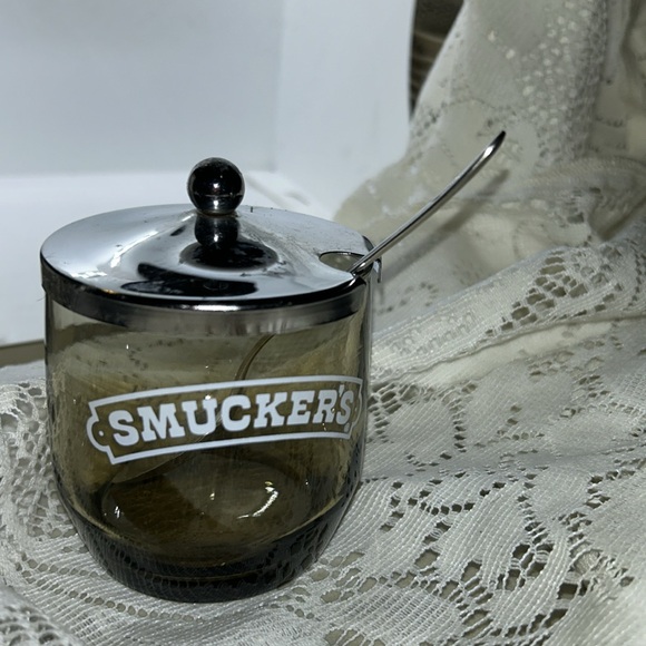 Smucker’s jelly jar with spoon. - Picture 2 of 3